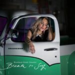 Breathe To Sing Single cover - Hanna Graves in green and white pickup